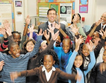 Michael Scott and the 3rd grade class he chose to sponsor.